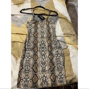 Leopard mini dress, brand new. Never worn.
